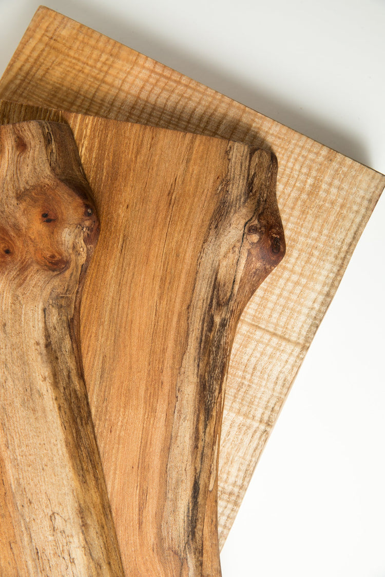 A selection of handmade, live edge chopping boards