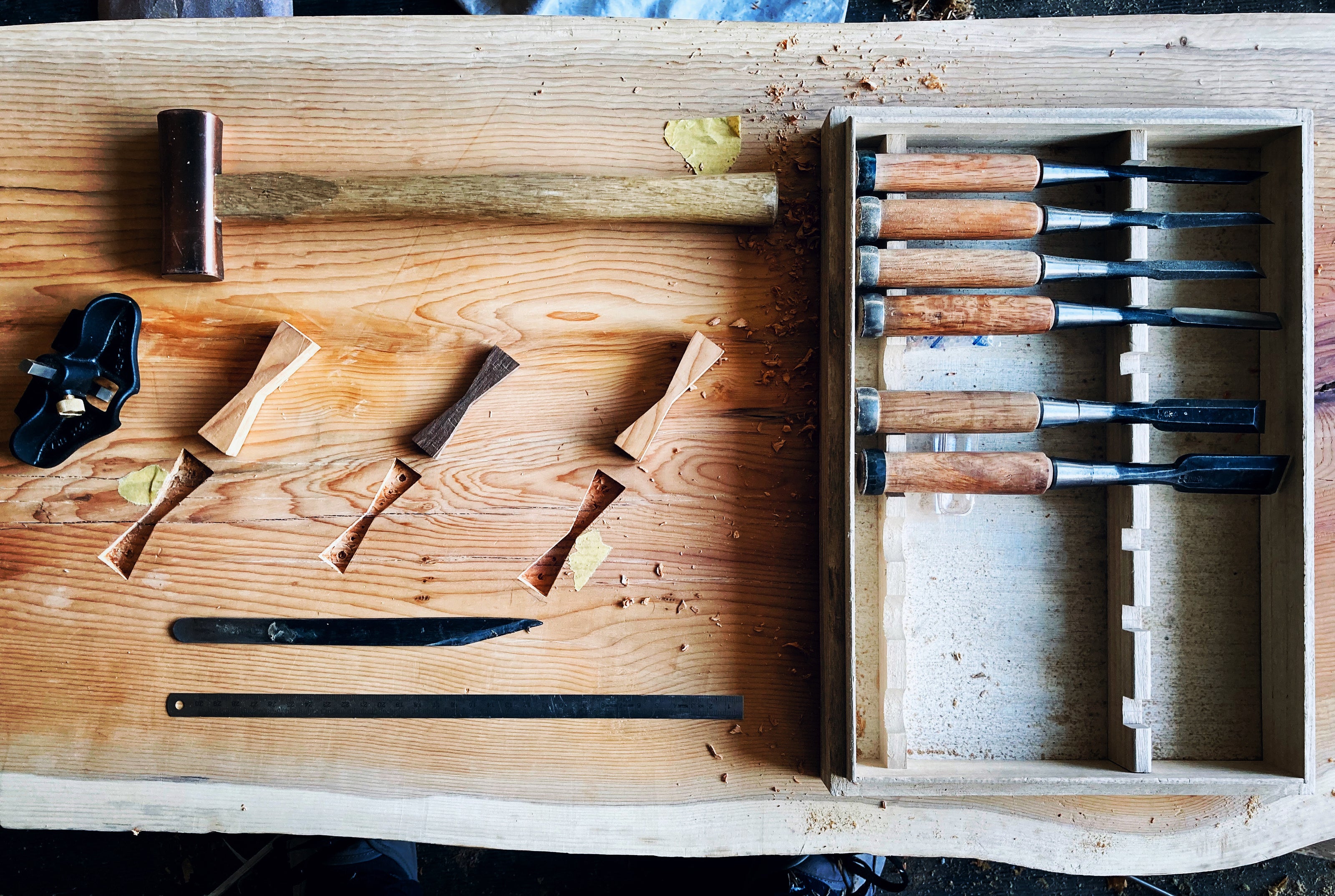 Hand cut butteryfly inlays in locally grown Yew. I use chisels and a hammer to cut the inlay